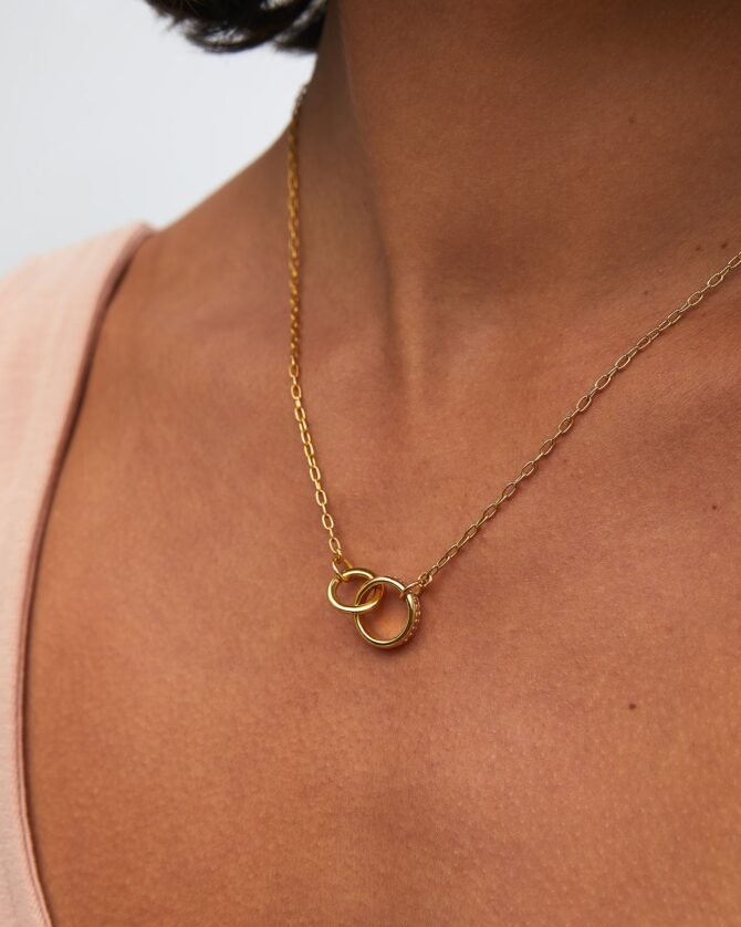 INTERTWINED CIRCLES CHARITY NECKLACE - Image 2